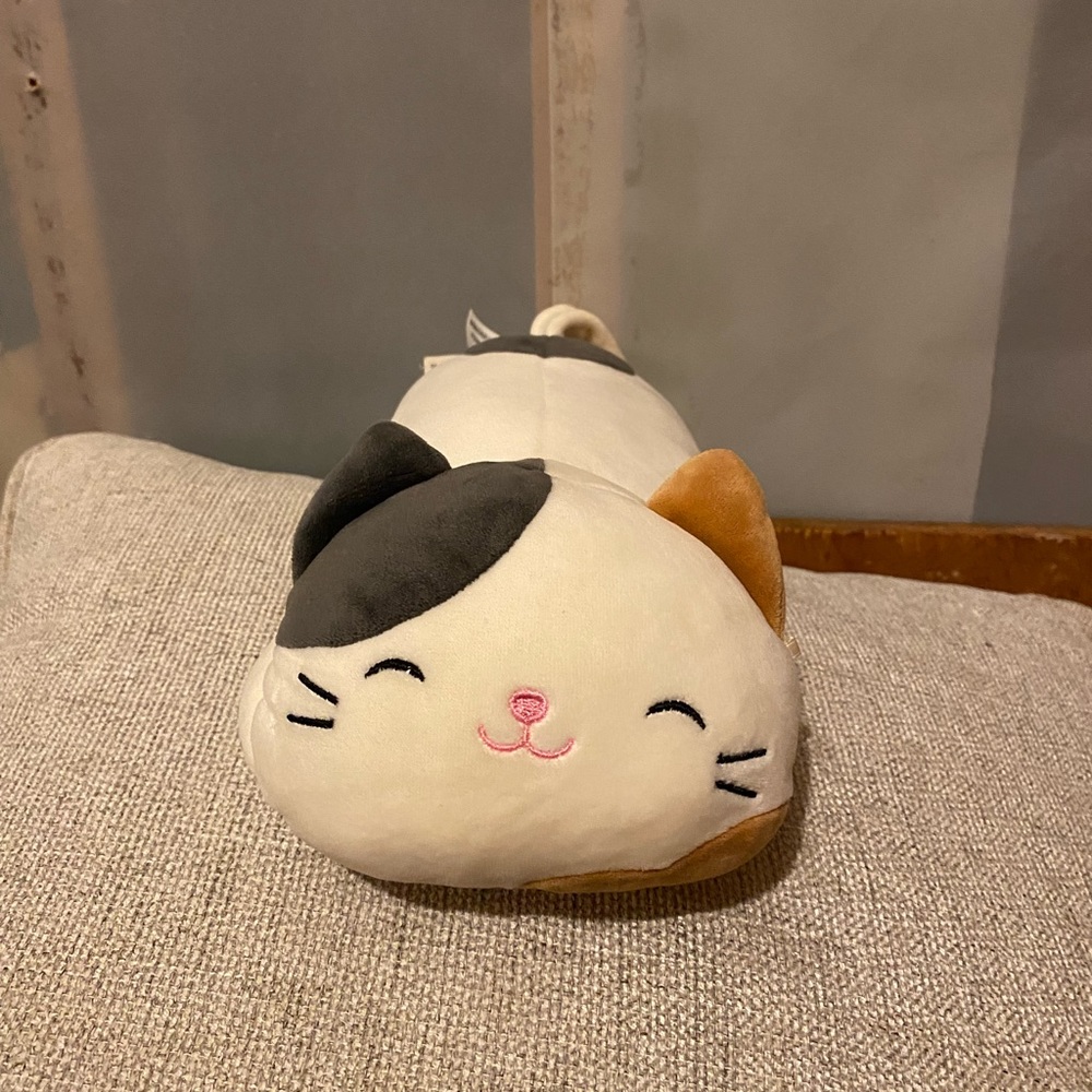 Mindy the calico cat hug mee laying squishmallow plush